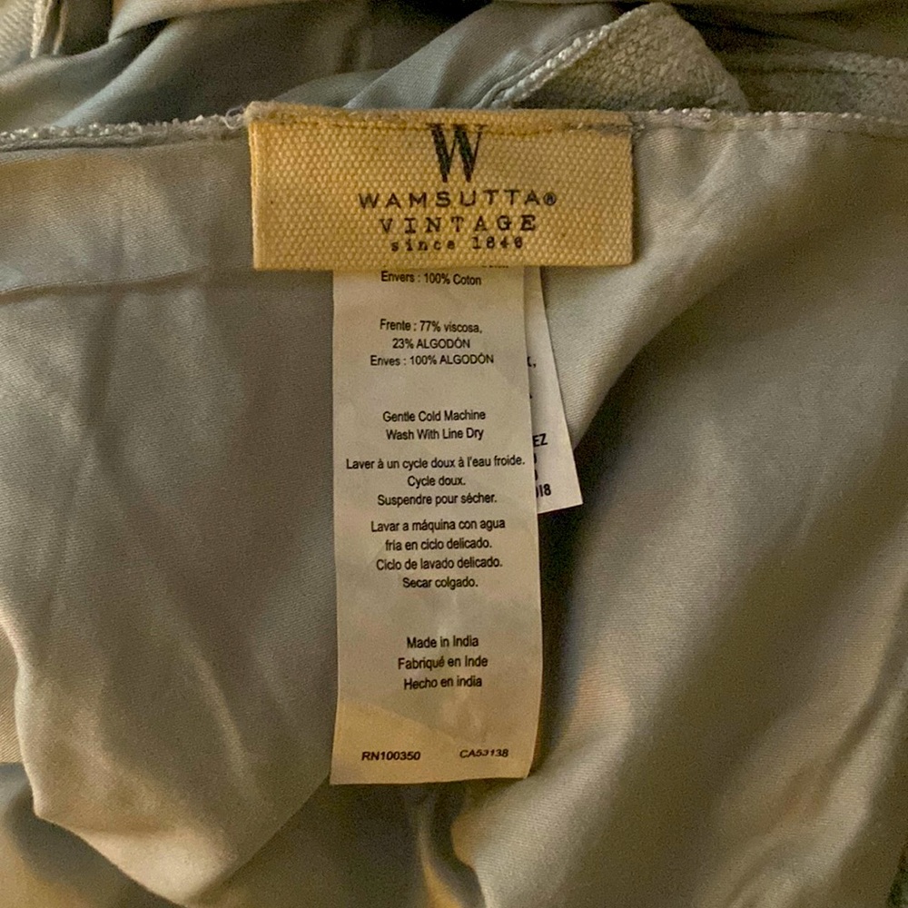Brand new. Ice blue/silver, tablecloth or blankie/throw. Very elegant/pretty.
